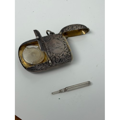 5 - A late Victorian silver combination sovereign holder/vesta/stamp case, Chester 1899, with later pres... 