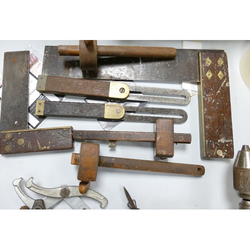 371 - A mixed collection of wood working tools including G Cramps, Set Squares, Scribes, Monkey Wrench etc