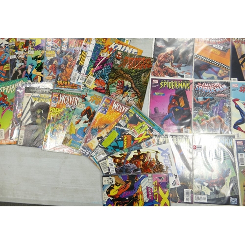 681 - A large collection of modern Marvel comics including: The Amazing Spiderman, X- Factor, Wolverine, V... 