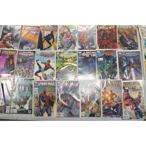 681 - A large collection of modern Marvel comics including: The Amazing Spiderman, X- Factor, Wolverine, V... 