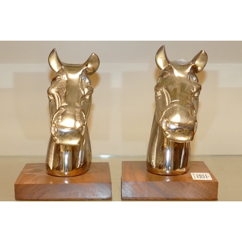 696 - Decorative Polished Metal Busts of Horses Heads: height 19cm(2)