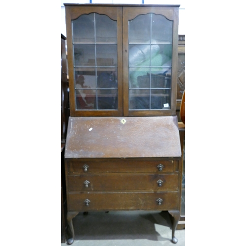 612 - Oak Bureau Bookcase: with leaded glass doors