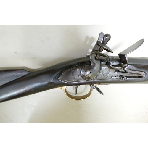 1064 - 20th Century Brown Bess Flintlock Musket: ordinance stamps on lock & barrel, complete with bayonet