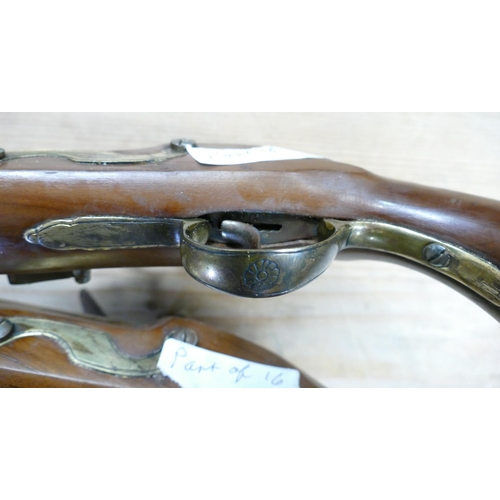 1066 - Pair of early copies of Flintlock Duelling Type Pistols: brass barrels, Ketland on locks