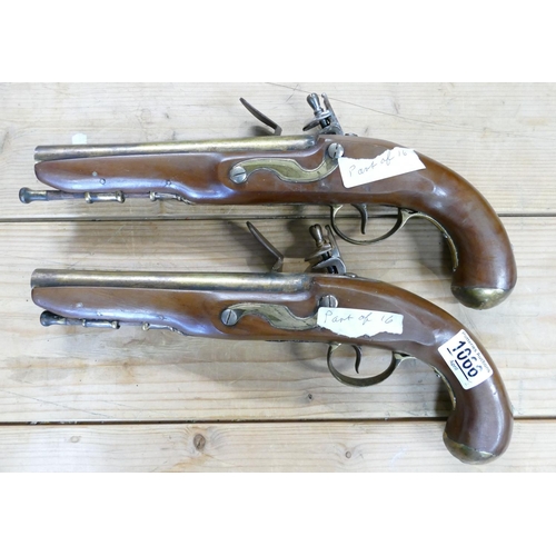 1066 - Pair of early copies of Flintlock Duelling Type Pistols: brass barrels, Ketland on locks