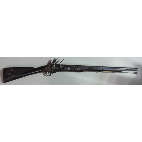 1073 - 20th century Brownbess Flintlock Carbine: Tower GR crown to lock, ordinance marks to barrel.