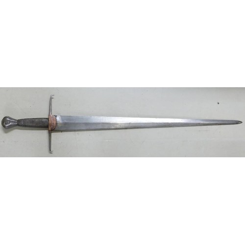 1081 - Victorian Italian Cinquedea sword: Broad double edged tapering blade, wire grip & chiselled pommel.