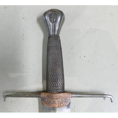 1081 - Victorian Italian Cinquedea sword: Broad double edged tapering blade, wire grip & chiselled pommel.