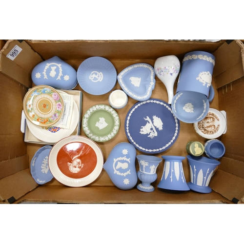 995 - A collection of Wedgwood Jasperware to include: lidded boxes, pin trays, vases, commemorative tankar... 