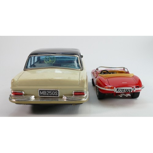 607 - Vintage tin plate models of a Mercedes and Burango model of E type Jaguar (2):