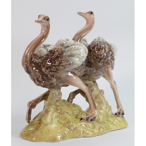 642 - Goldscheider Ostrich figure group: Measuring 27.5cm wide x 27cm high x 15cm deep. C1890 - 1910.