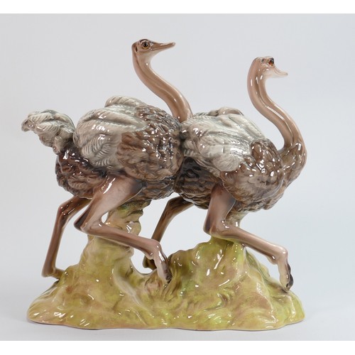 642 - Goldscheider Ostrich figure group: Measuring 27.5cm wide x 27cm high x 15cm deep. C1890 - 1910.