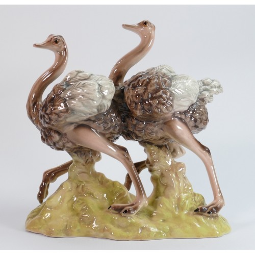 642 - Goldscheider Ostrich figure group: Measuring 27.5cm wide x 27cm high x 15cm deep. C1890 - 1910.