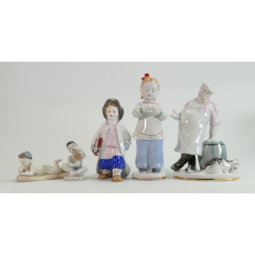 656 - Russian Lomonosov pottery figures of Children and a Chef: Height of tallest 20cm. (5)