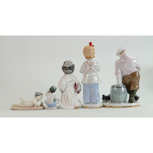 656 - Russian Lomonosov pottery figures of Children and a Chef: Height of tallest 20cm. (5)