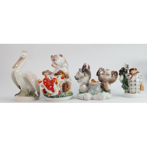 657 - Russian Lomonosov pottery figures of comical bears and a pelican: Height of tallest 19cm. (4)