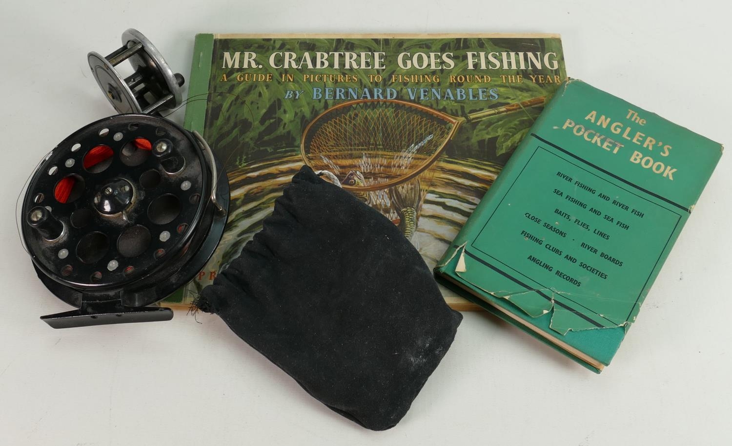 A collection of vintage fishing related items to include: Allcocks