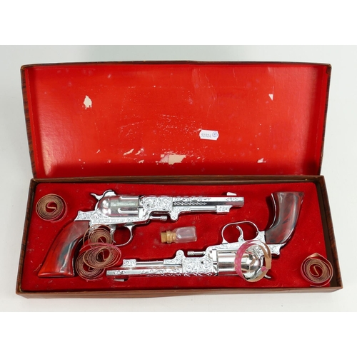 619 - Crescent boxed matched pair set of Cap Pistols: Comprising 2 x Rustler Texan Cowboy Repeating Action... 