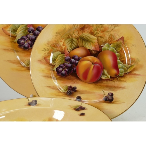 1150 - Aynsley Orchard Gold dinner set: Comprising various size plates, bowls, tureen & cover, candlesticks... 