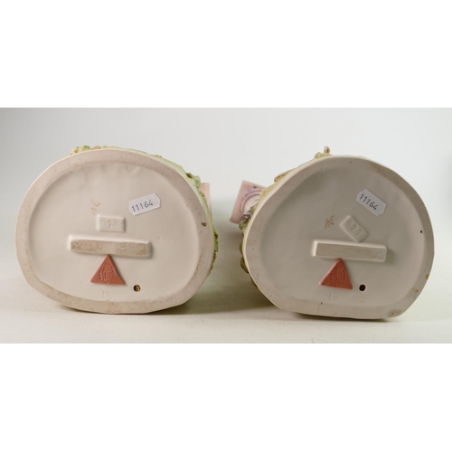 638 - Large pair of Royal Dux figures: Girl & boy standing with sheep by architectural columns, circa 1900... 