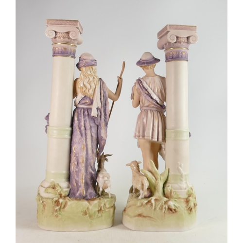 638 - Large pair of Royal Dux figures: Girl & boy standing with sheep by architectural columns, circa 1900... 