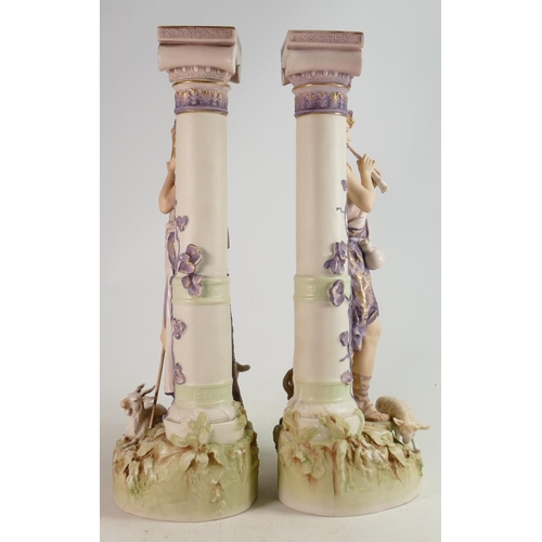 638 - Large pair of Royal Dux figures: Girl & boy standing with sheep by architectural columns, circa 1900... 