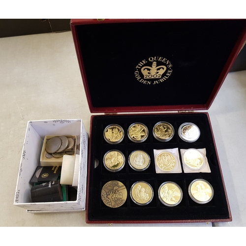 149G - Cased gold plated coins to include East Caribbean state 2 dollars: 1944-1994 commemorative medal tog... 