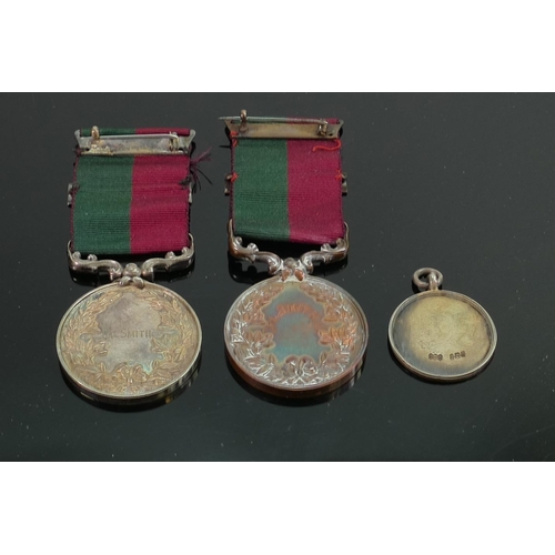 1538 - A collection of military and sporting medals: To include 1933 football medal awarded to 4969817 Lanc... 