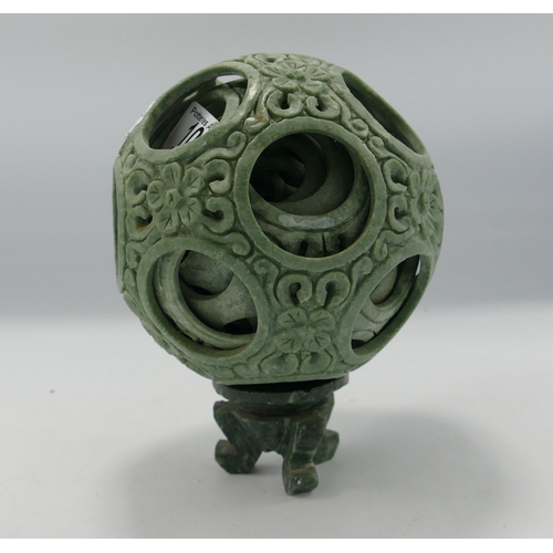 107 - Oriental soft stone puzzle ball: and stand height 17cm