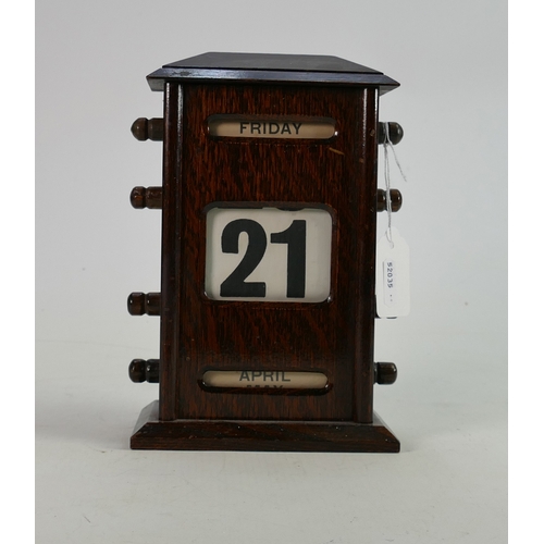 303 - Oak cased desk Calendar circa 1930: Measuring 20 cm.