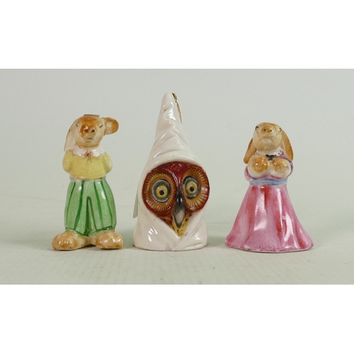 25 - Royal Worcester Owl candlesnuffer: puce marks and two unmarked rabbit figures. (3)