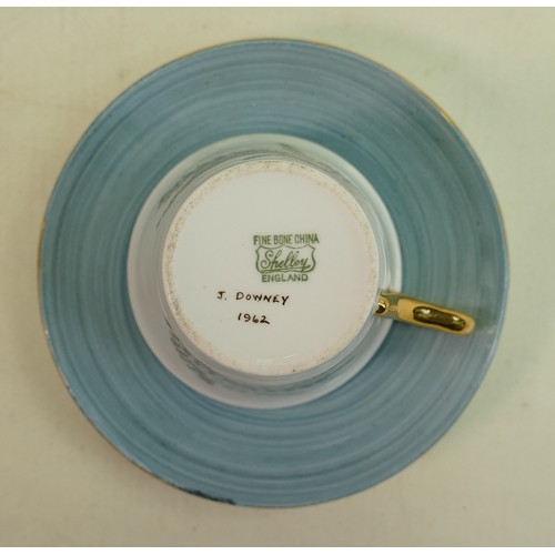 809 - Hand painted on Shelley blank coffee ware to include: 15 piece set, some signed J Downey 1962.