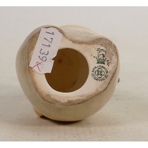 174 - Royal Doulton early seated lop eared rabbit: Decorated  in natural colours, height 10.5cm.