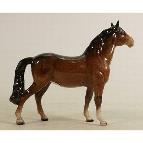 279 - Beswick brown head up pony 1197: (Tiny nick to point of one ear).