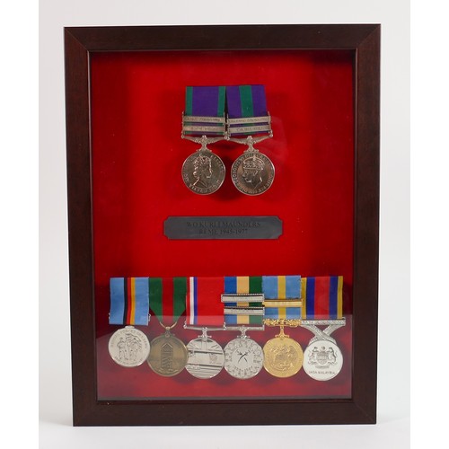 656 - A collection of medals awarded to H Maunders: Comprising Elizabeth General Service medal with Borneo... 