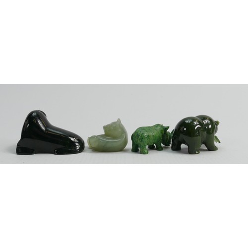 668 - A collection of hardstone & jade figures including: Walrus, bears & rhinoceros, tallest 3.5cm (4)