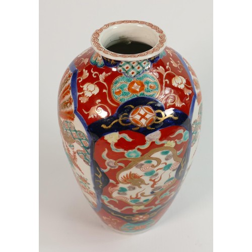 674 - 19th century Japanese Imari decorated vase: Chip to upper rim, height 23.5cm.