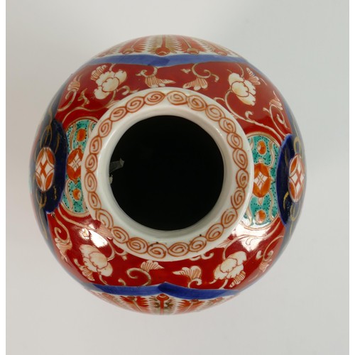 674 - 19th century Japanese Imari decorated vase: Chip to upper rim, height 23.5cm.