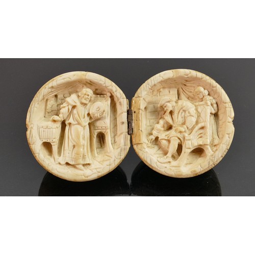 697 - 18/19th century Dieppe carved Ivory Diptych with Religious scene: Diameter 5.5cm.

Please note that ... 