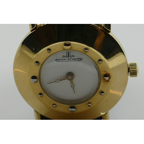 638 - Jaeger le Coultre 14ct gold vintage wristwatch: Gents/ladies dial diameter 3cm with leather strap.