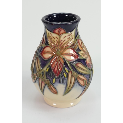 173 - Moorcroft Peruvian Lily Patterned Vase: factory seconds , height 13cm