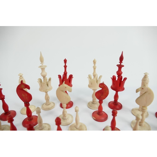 526 - 19th Century Finely Carved & Turned Bone Chess Set: damage noted to red knight & white rook, height ... 