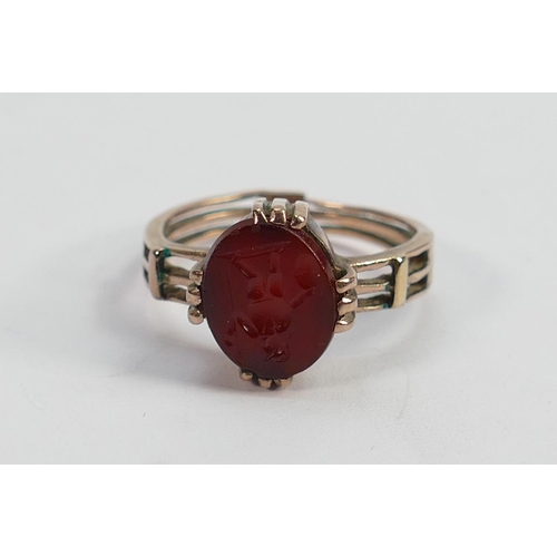 614 - 9ct gold and hardstone intaglio set ring size P: Weight 3.6g, not hallmarked but tests as 9ct or bet... 