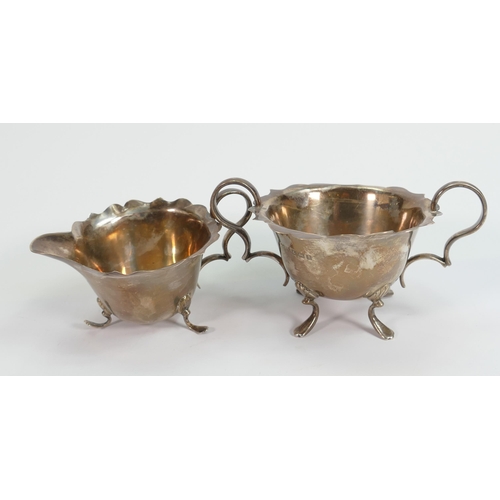 764 - Silver cream jug & sugar bowl 20th century: Gross weight 235g.