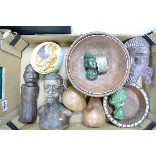 1025 - A collection of African & similar items to include: hard wood busts, painted ostrich egg, inlaid bow... 