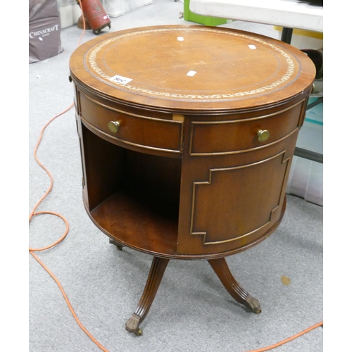 860 - Edwardian Mahogany  leather topped swivel drum table: with claw feet castors. 51cm diameter x 67cm h... 