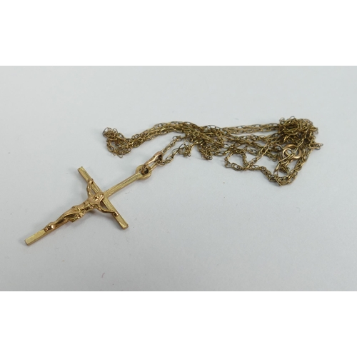 737 - 9ct gold crucifix and 9ct necklace, 1.3g: