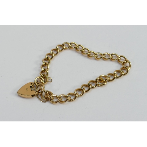 646 - 9ct gold modern bracelet with heart locket, 15.5g: