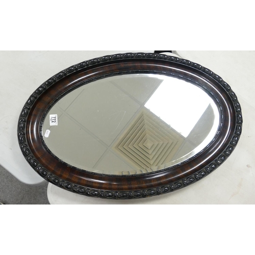 772 - Oval Wooden Framed Wall Mirror:  diameter at widest 81cm