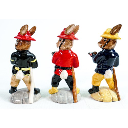 201 - Three Royal Doulton Bunnykins figures: The Fireman DB183 USA limited edition colourway together with... 